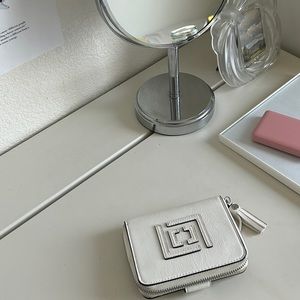 white wallet (unknown brand)